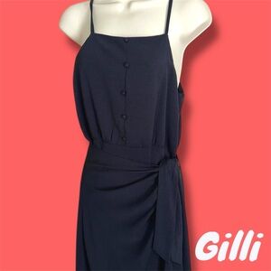 Gilli black dress with side tie. Not a true wrap dress. Nice high low dress